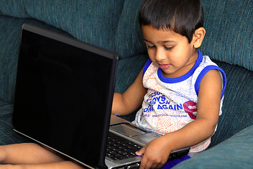 Image showing Playing with Laptop