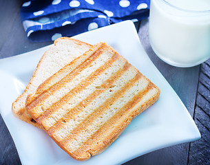 Image showing toasts with milk