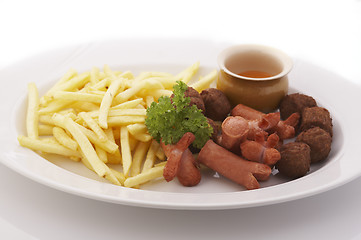 Image showing French fries and meatballs