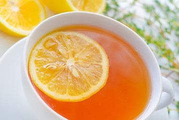 Image showing Fresh tea with lemon in the white cup