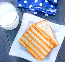 Image showing toasts with milk