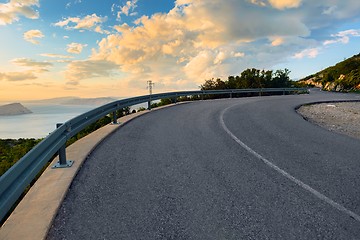 Image showing Beautiful coastal road at sunset