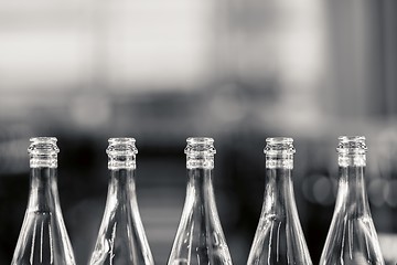 Image showing Many bottles on conveyor belt