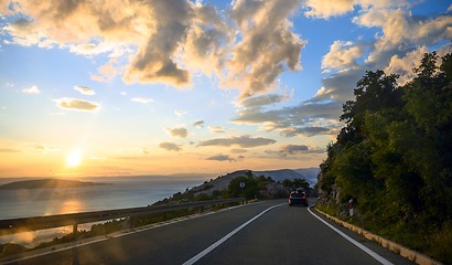 Image showing Beautiful coastal road at sunset