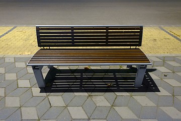 Image showing Modern bench on the sidewalk