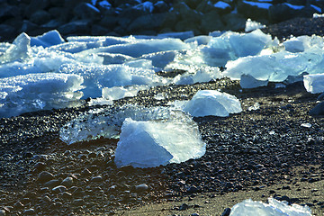 Image showing Ice floes at glacier lagoon Jokulsarlon in the evening sun