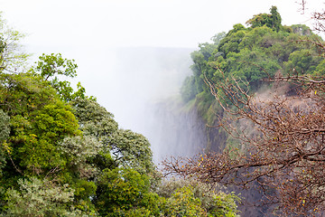 Image showing The Victoria falls with mist from water