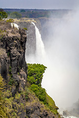 Image showing The Victoria falls with mist from water