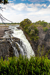 Image showing The Victoria falls with mist from water