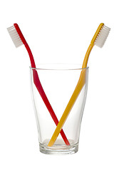 Image showing Two toothbrush in a glass

