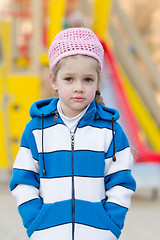 Image showing Portrait a four-year girl on background of playground