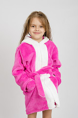 Image showing Portrait of six-year girl in a pink bathrobe