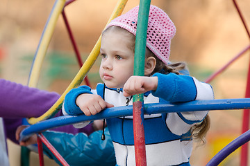 Image showing Four-year girl thought playing on the playground