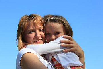 Image showing mother and daughter embrace