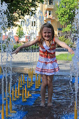 Image showing little sympathetic girl in fountains