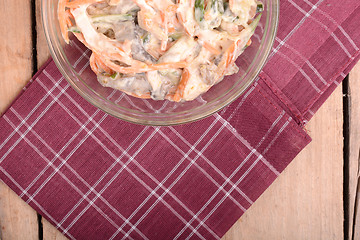 Image showing Fresh salad on glass bowl