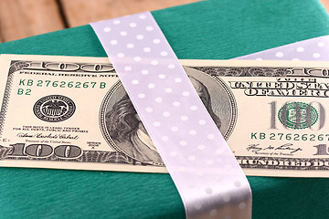 Image showing american money and green gift box