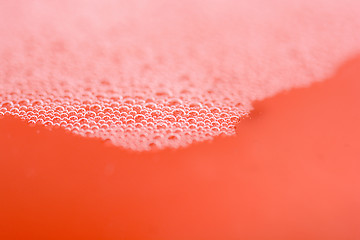 Image showing red water drops close up