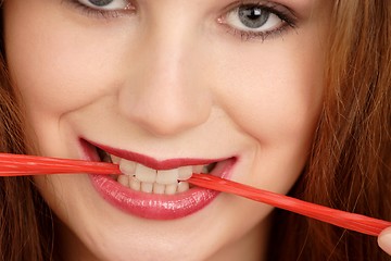 Image showing Woman with chewing gum