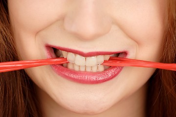 Image showing Woman with chewing gum