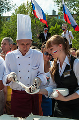 Image showing A cake in the shape of the flag of Russia