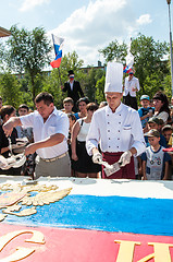 Image showing A cake in the shape of the flag of Russia