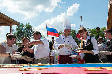 Image showing A cake in the shape of the flag of Russia