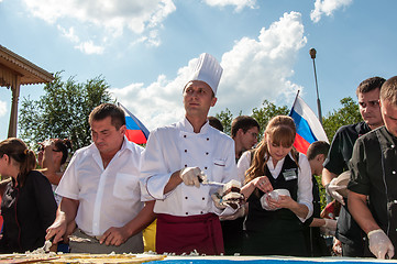 Image showing A cake in the shape of the flag of Russia