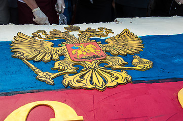 Image showing A cake in the shape of the flag of Russia