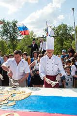 Image showing A cake in the shape of the flag of Russia