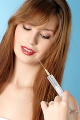 Image showing Woman with syringe