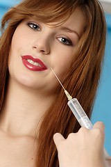 Image showing Woman with syringe