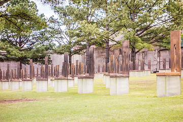 Image showing The Oklahoma Bombing Monument with empty chair sculptures that m