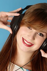 Image showing Woman listening music