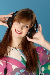 Image showing Woman listening music