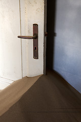 Image showing Door and sand