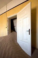 Image showing Door and sand
