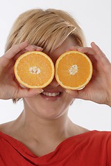 Image showing Woman with orange