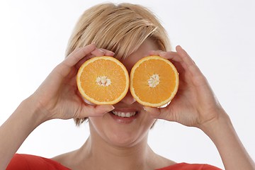 Image showing Woman with orange