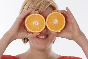 Image showing Woman with orange