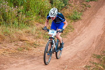 Image showing Competitions cyclists in cross-country 