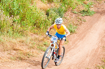 Image showing Competitions cyclists in cross-country 