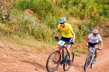 Image showing Competitions cyclists in cross-country 