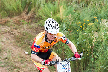 Image showing Competitions cyclists in cross-country 