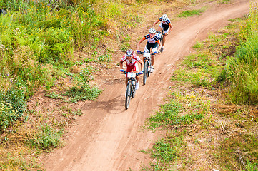 Image showing Competitions cyclists in cross-country 