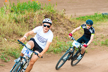 Image showing Competitions cyclists in cross-country 