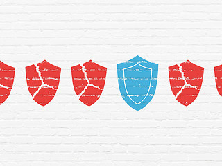 Image showing Privacy concept: shield icon on wall background