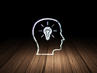 Image showing Data concept: Head With Lightbulb in grunge dark room