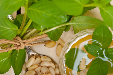 Image showing Arab traditional mint and pine nuts tea