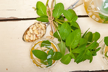 Image showing Arab traditional mint and pine nuts tea